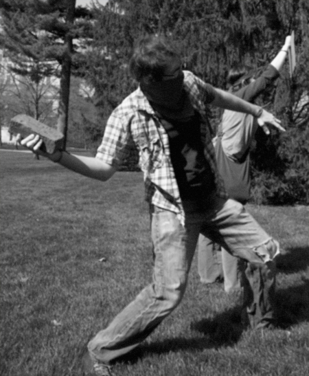 Brick-throwing rioter
